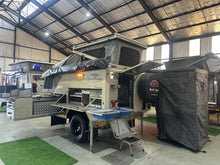 2025 Bush Lapa Miskruier off-road caravan in full camp setup — pop-top roof up, slide-out kitchen open and shower tent erected — 4Matt Campers, Bellville Western Cape