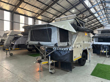 2025 Bush Lapa Miskruier with pop-up roof raised and canvas surrounds, front three-quarter view — used off-road caravan Western Cape (view 2)