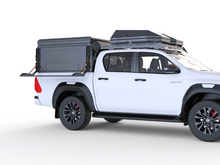 Alu-Cab Camper Trax side table folded out with recovery trax, photo 4