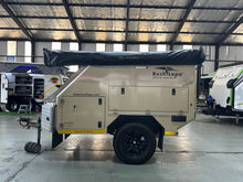2018 Bush Lapa Boskriek: side profile in travel mode with the Bush Wing awning rolled up