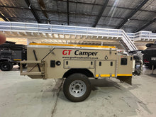 2017 GT Camper off-road trailer side view showing storage compartments and off-road running gear