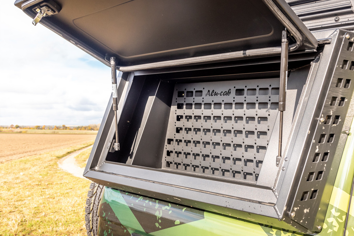 Alu-Cab universal recovery molle plate fitted in a Land Cruiser 76 side window box
