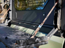 Alu-Cab Camper Trax side table folded out with recovery trax, photo 8