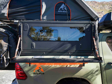 Alu-Cab Camper Trax side table folded out with recovery trax, photo 6