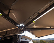 Underside of the Deltawing 270° XL Awning showing the aluminium arms and integrated LED lighting