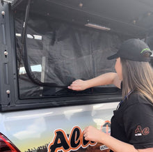 Alu-Cab mid-size Canopy Camper single side door mozzie and midge net