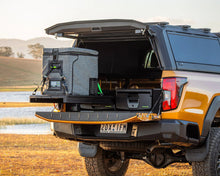 Ironman roller drawers extended in Toyota Hilux load bed