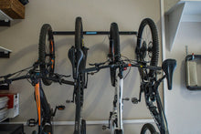 Holdfast Vertical Wall Mounted Bike Hangers storing bikes upright, photo 3