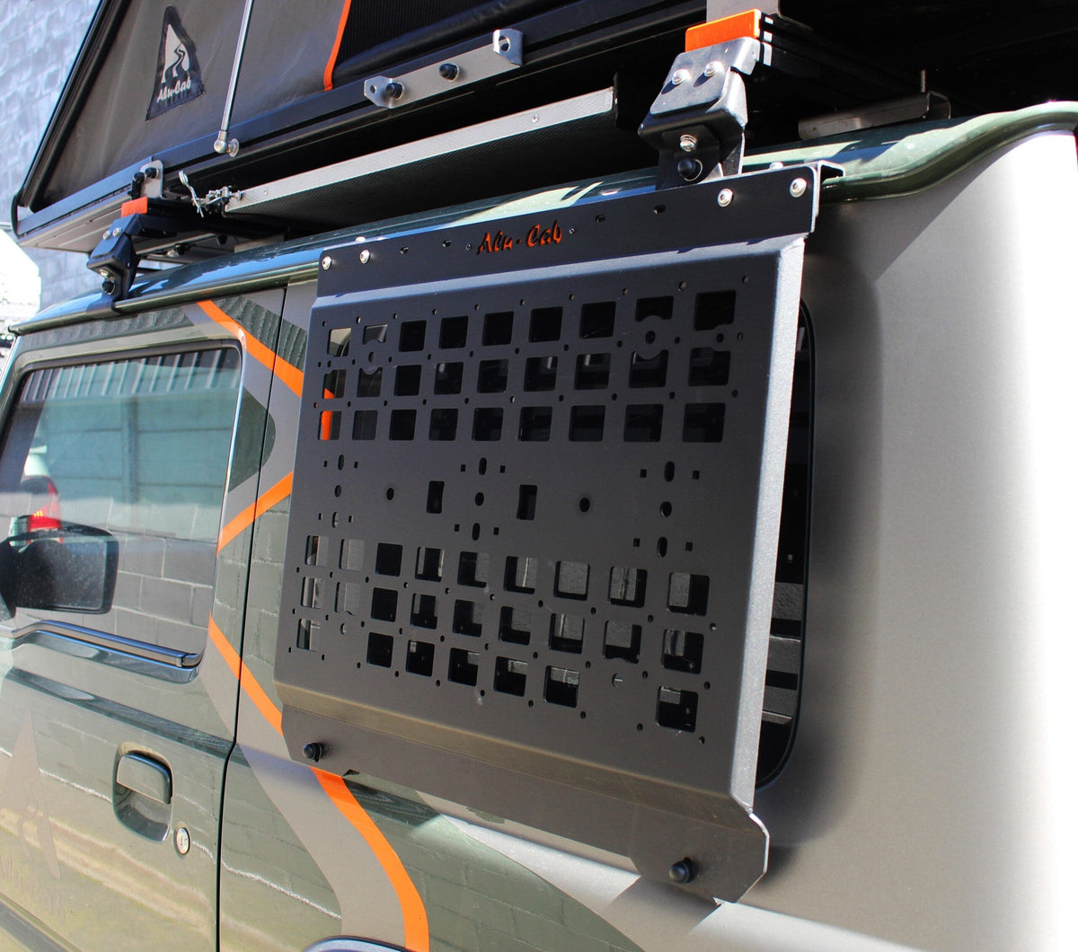 Alu-Cab Jimny Exterior Molle Plate mounted on a Jimny