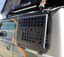 Alu-Cab Jimny Exterior Molle Plate mounted on a Jimny