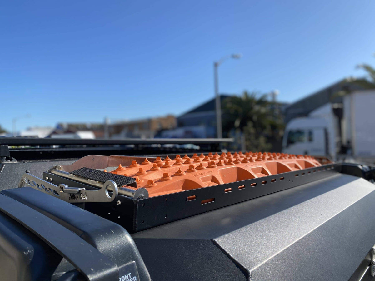 Alu-Cab Recovery Trax Tray holding Maxtrax