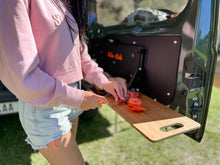 Alu-Cab Jimny Rear Door Drop-Down Table folded out from a Jimny, photo 2