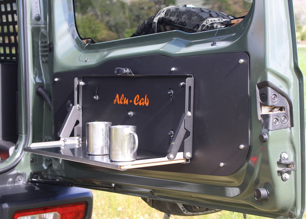 Alu-Cab Jimny Rear Door Drop-Down Table folded out from a Jimny