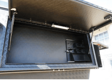 Alu-Cab Khaya Basic camper unit in black on a truck, photo 6