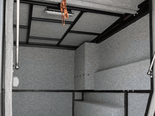 Alu-Cab Khaya Basic camper unit in black on a truck, photo 5