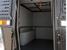Alu-Cab Khaya Basic camper unit in black on a truck, photo 4