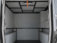 Alu-Cab Khaya Basic camper unit in black on a truck, photo 3