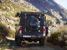 Alu-Cab spare wheel mount on the rear door of a Canopy Camper, photo 2