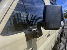 Alu-Cab Mirror Extensions fitted to a Land Cruiser side mirror