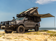 Alu-Cab Khaya Comfort 2 Sleeper camper unit in black on a truck