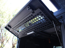 Alu-Cab ModCAP interior security window grid with Molle pattern