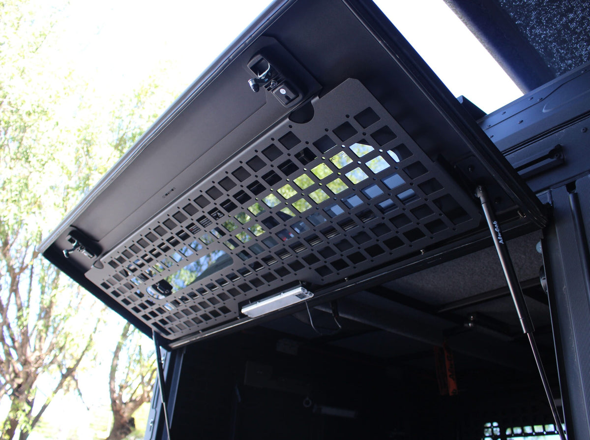 Alu-Cab ModCAP interior security window grid for a Land Cruiser double cab