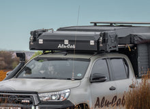 Alu-Cab Roof Box Small (The Escape) mounted on a roof rack