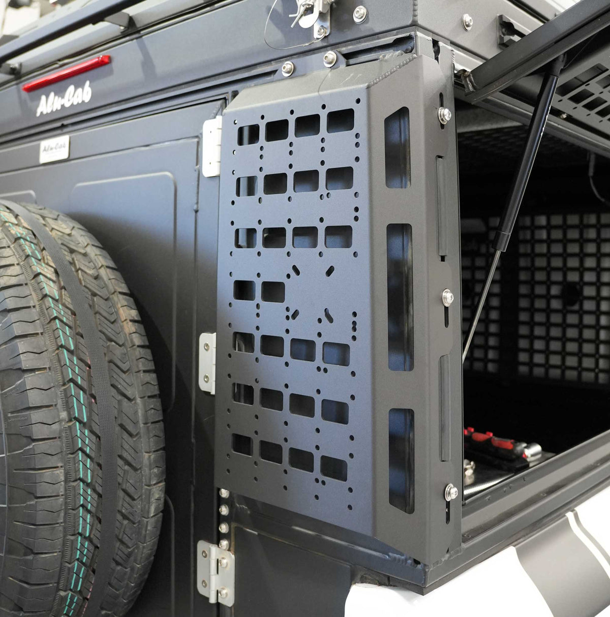 Alu-Cab ModCAP rear exterior Molle plates for a Land Cruiser
