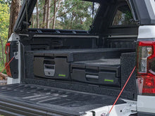 Ironman roller drawer system in a bakkie load bed