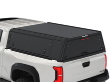 Alu-Cab Guard Canopy with no windows in black smooth for the Toyota Hilux Revo double cab, photo 5