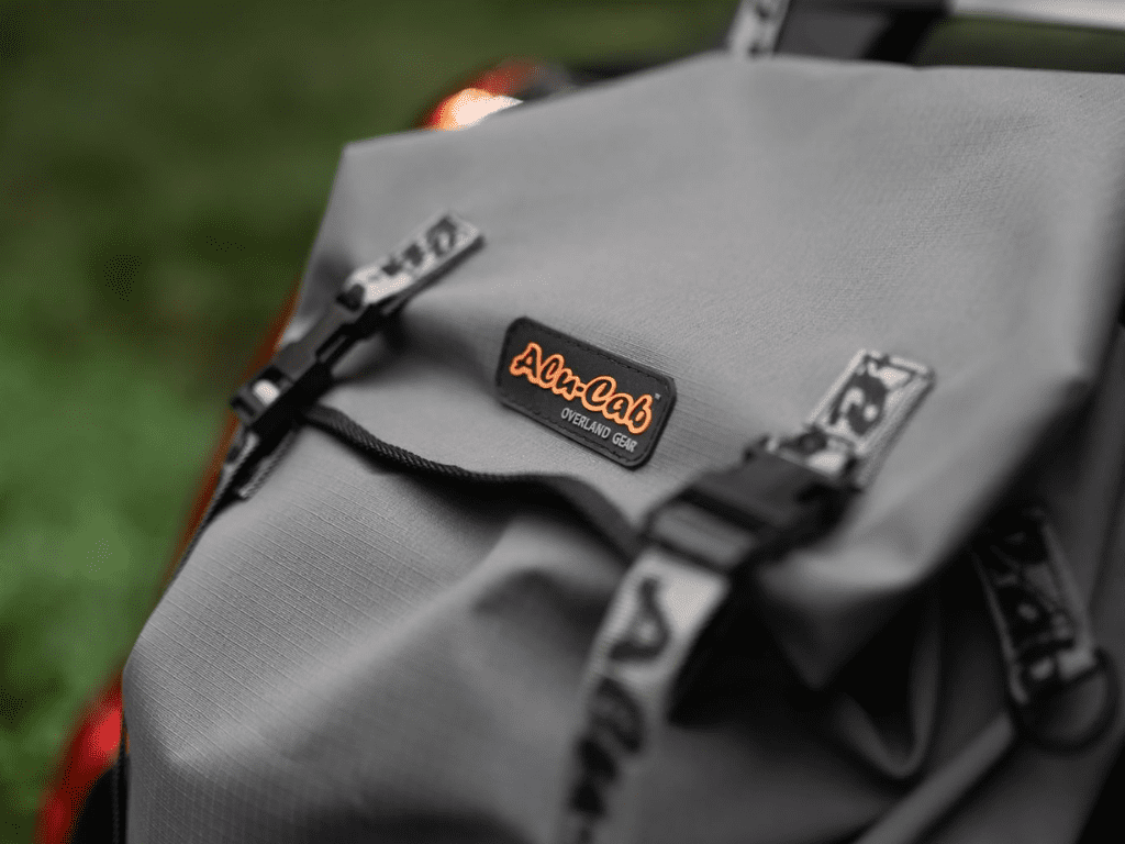 Alu-Cab Shoe / Mud Bag mounted on cargo rails