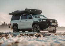 Alu-Cab Roof Box Small (The Escape) mounted on a roof rack, photo 2