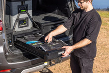 Land Cruiser with Ironman 4x4 drawer system open at camp
