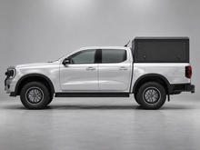 Alu-Cab ModCAP base with flat roof on a Ford Ranger double cab, aluminium side windows
