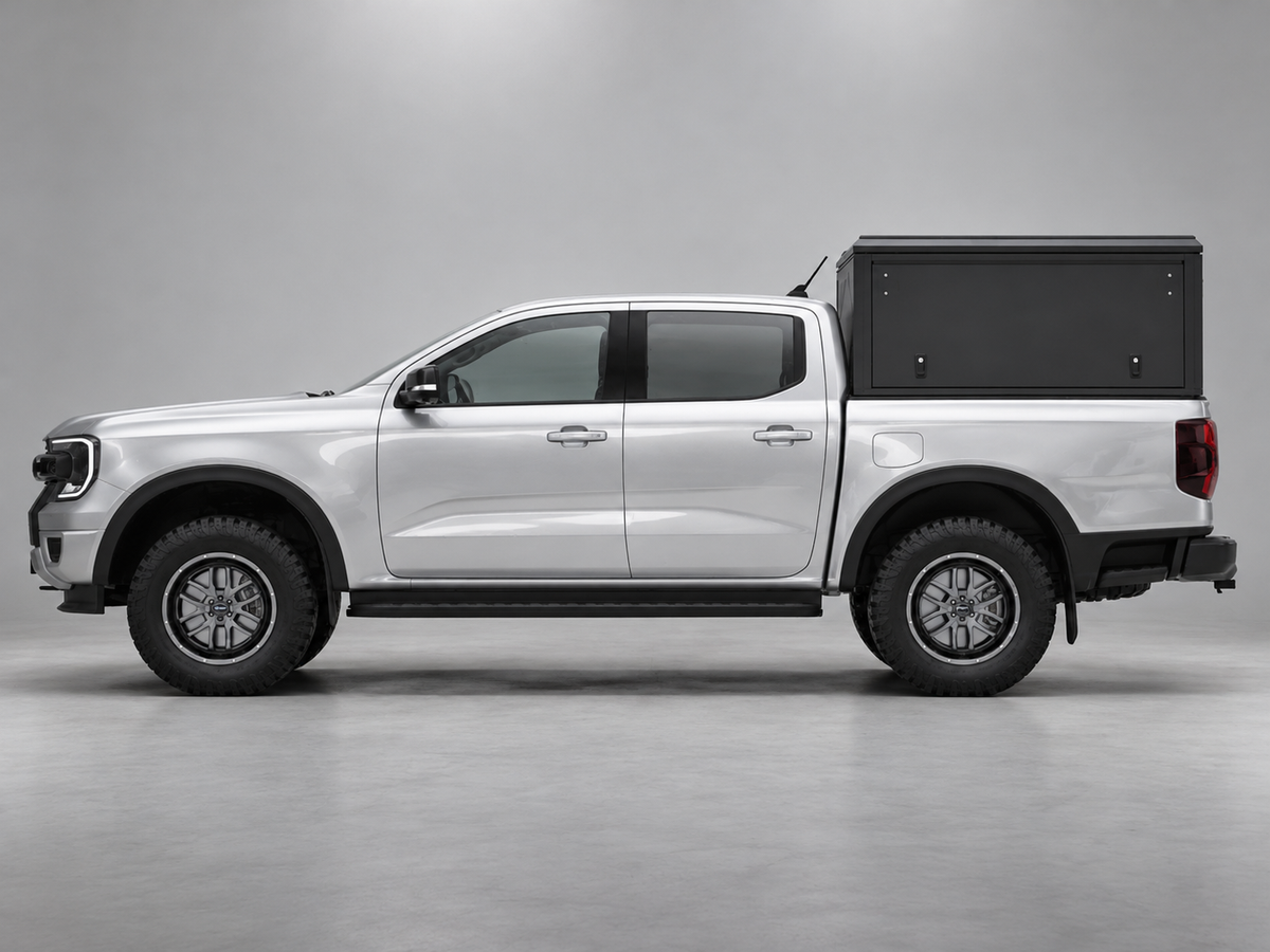 Alu-Cab ModCAP base with flat roof on a Ford Ranger double cab, aluminium side windows