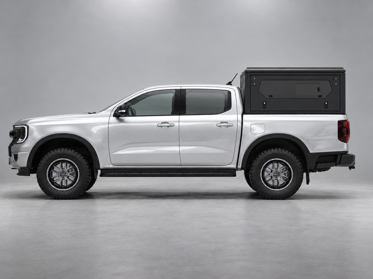 Alu-Cab ModCAP base with flat roof on a Ford Ranger double cab, glass side windows