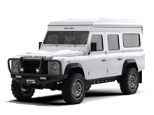 Alu-Cab Icarus roof conversion, white, closed on a Land Rover Defender 110