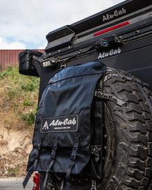 Alu-Cab Spare Wheel Bag (Large) strapped over a large all-terrain spare tyre