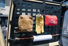 Alu-Cab rear door molle plate on a Land Cruiser 78 Troopy with gear attached