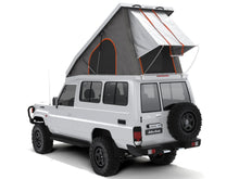 Alu-Cab Hercules roof conversion, white, open, rear three-quarter view