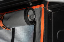 Alu-Cab rear mozzie net, rolled privacy canvas and zip detail