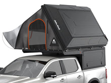 Alu-Cab ModCAP Family tent on a double cab ModCAP base, mounting kit in place, tent open