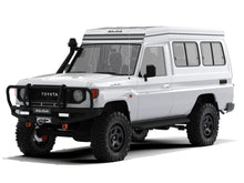 Alu-Cab Hercules roof conversion, white, closed on a Land Cruiser 78 Troopy