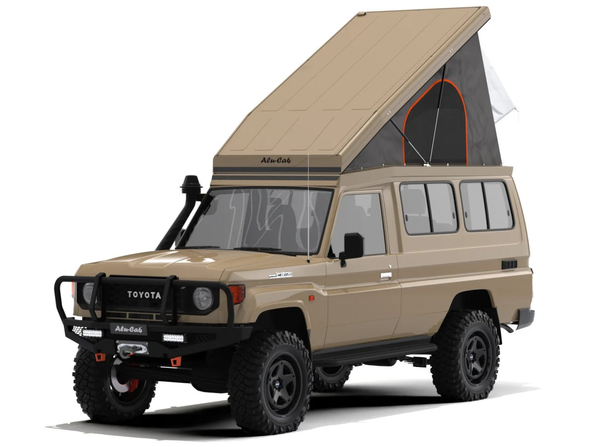 Alu-Cab Hercules roof conversion, beige/tan, open on a Toyota Land Cruiser 78 Troopy