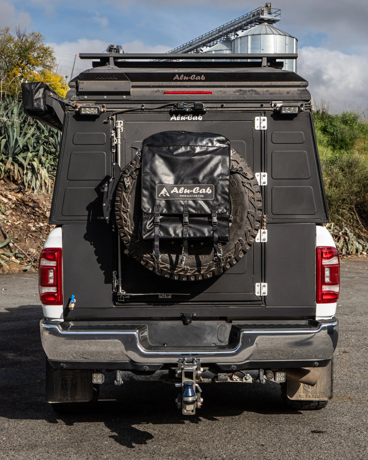 Alu-Cab Spare Wheel Bag (Large) on a large spare tyre on a ModCAP camper, rear view