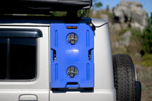 Alu-Cab Jimny 10L blue water jerry can on the molle panel of a silver Jimny