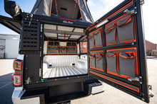 Canopy Camper Deluxe rear doors with canvas bags and MOLLE plates