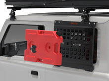 Alu-Cab Jimny 10L red fuel jerry can lifted off its mount, exploded render