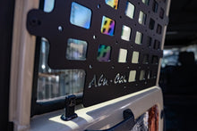 Alu-Cab rear door molle plate mounted on the inside of the Troopy rear door