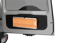 Alu-Cab Jimny Rear Door Drop-Down Table folded closed on the rear door, render